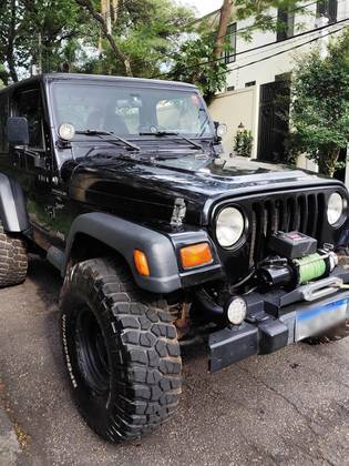 JEEP WRANGLER 4.0 SPORT 4X4 TETO LONA 6I 12V GASOLINA 2P AUTOMÁTICO JEEP WRANGLER 4.0 SPORT 4X4 TETO LONA 6I 12V GASOLINA 2P AUTOMÁTICO